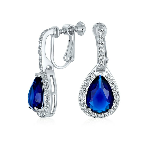 Oval Cut Simulated Blue Sapphire With Cubic Zirconia Halo Stud Earrings In 14K Gold Over Sterling Silver 